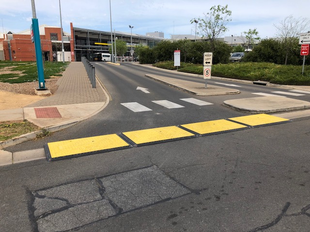 4 Trench Covers sitting on a road