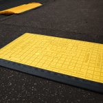 Trench-cover-yellow-on-gorund Trench-cover-yellow-on-gorund