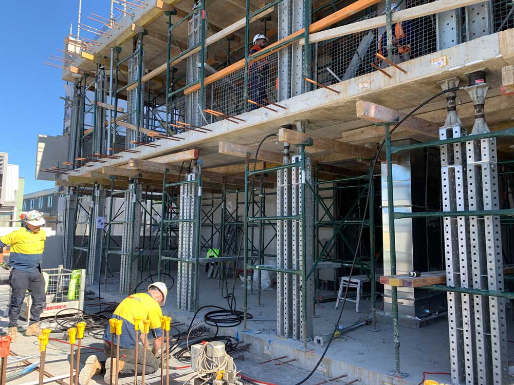 Back propping being used to hold up a building Back propping being used to hold up a building