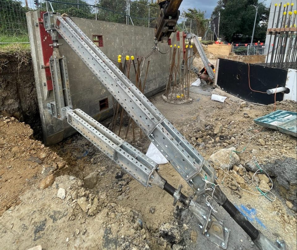 Propping and shoring being used as a retaining wall in a recent project.